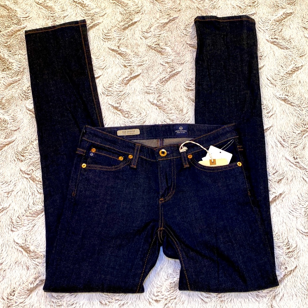 AG The Stevie Slim Straight Dark Blue with Brown Stitching. 7.5” rise 30”length